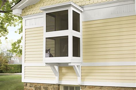 I started with the small enclosure around the living room window. How to Build a Catio | Screened in patio, Cat patio, Catio