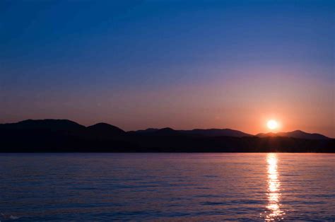 Sunrise Over Lake And Mountains Free Stock Photo Public Domain Pictures