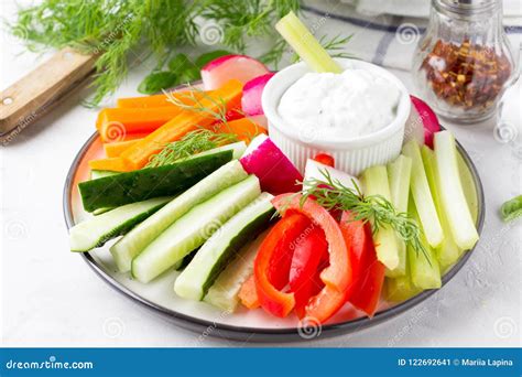 Vegetable Sticks Of Cucumber Pepper Carrots Celery And Radish Stock