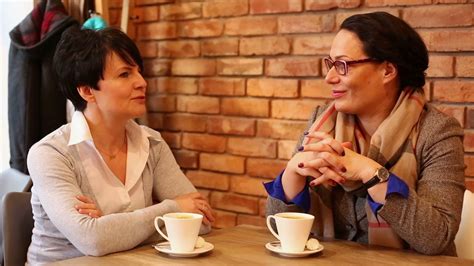 Two Women Talking In Cafe Drinking Coffee Stock Footage Sbv 313358442 Storyblocks