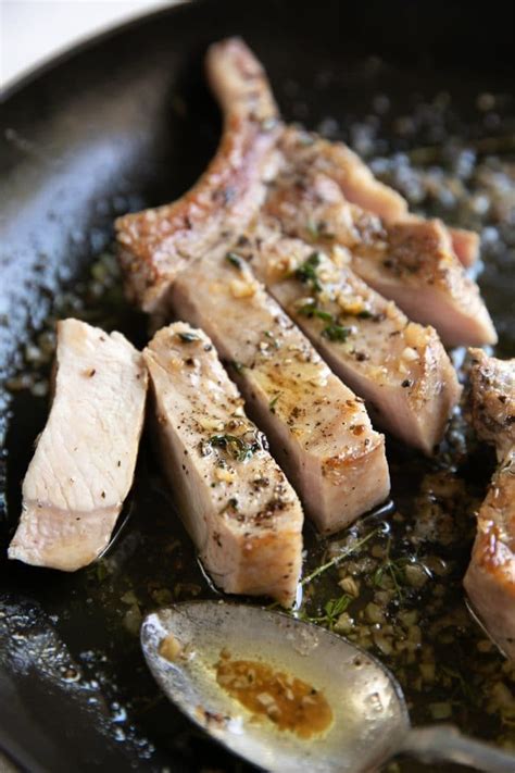 Thin cut bone in pork chops baked in the oven. Garlic Butter Pork Chop Recipe (ready in just 15 minutes ...