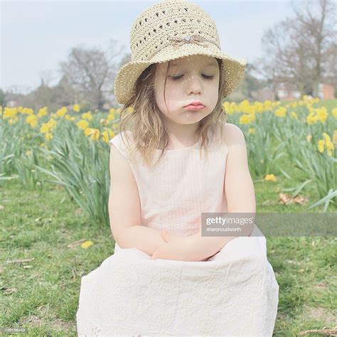 Girl Sitting In A Field Sulking High Res Stock Photo Getty Images