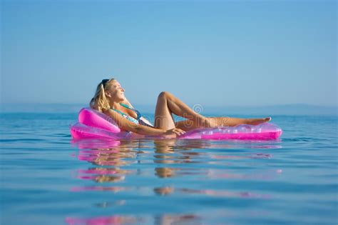 Blonde Girl On Inflatable Raft Stock Photo Image Of Enjoy Female