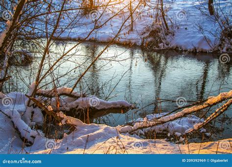 Snow Falling On A River With Snowy Banks Stock Image Image Of Beauty