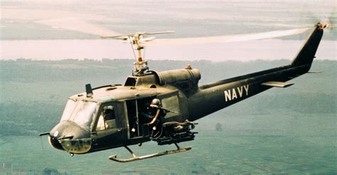American Gunners Firing From Helicopter In Vietnam 3