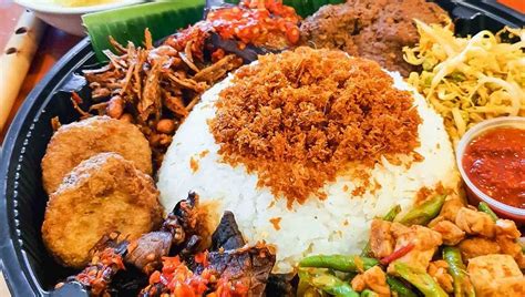 You can expect to find these items on the menu: Tracing The Origins Of Nasi Ambeng