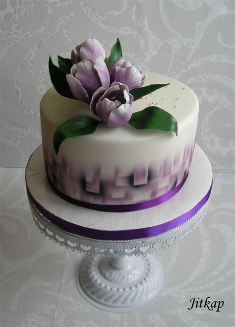 So for her birthday she got a cake with her very own fondant kitty cat sitting on top of a vegan, gluten free chocolate cake. Birthday Cake With Tulips - CakeCentral.com