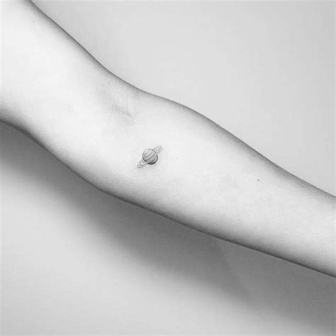 Saturn Tattoo On The Inner Forearm
