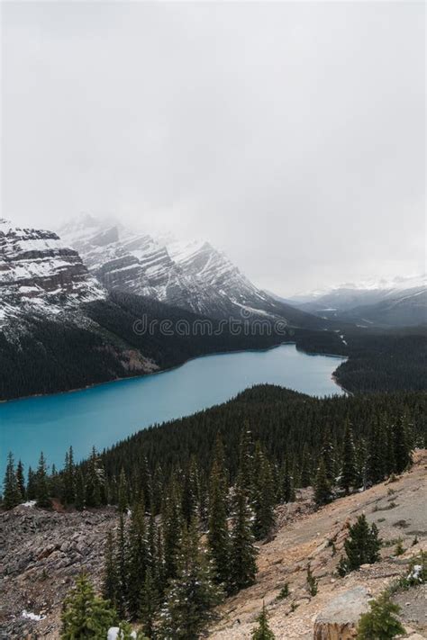 High Angle Shot Of A Clear Frozen Lake Surrounded By A Mountainous