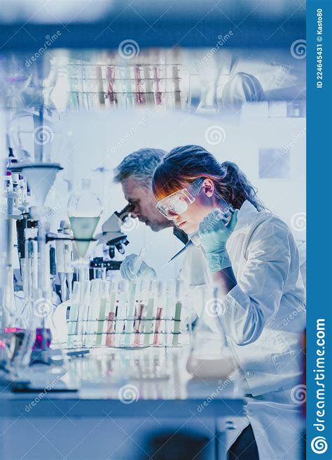 Health Care Researchers Working In Scientific Laboratory Stock Image