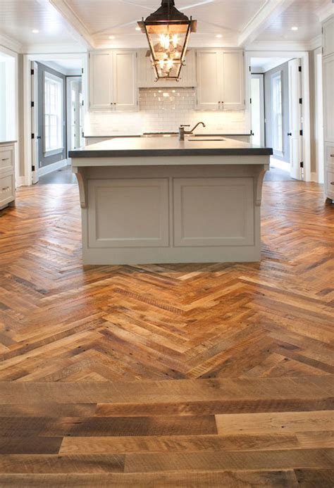 Dark wooden floor in a large kitchen. Herringbone Wood Floor - Transitional - kitchen - Mountain Lumber