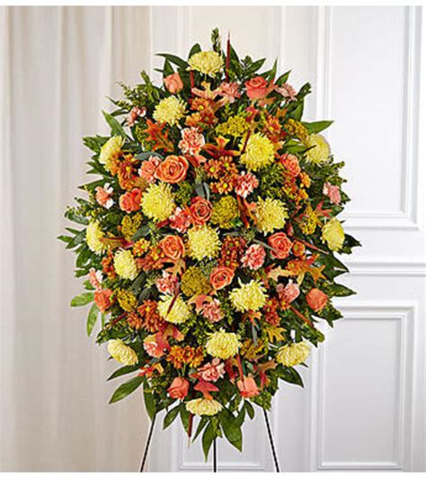 You can say a lot with carnations, and several colors are appropriate for funeral arrangements. Sympathy Standing Spray in Fall Colors - Wilmington, DE ...