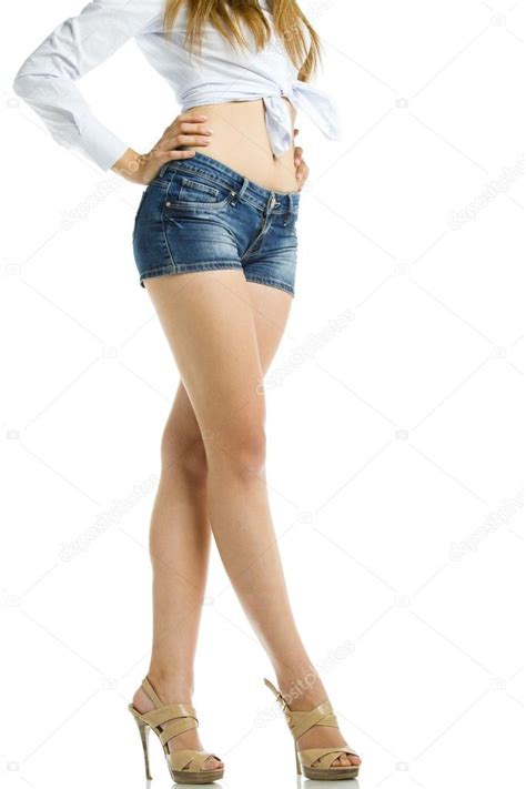 Sexy Woman Legs In Jean Shorts Isolated On White Background Stock Photo By Baronerosso