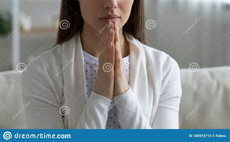 Close Up Of Young Woman Praying At Home Stock Image Image Of Join