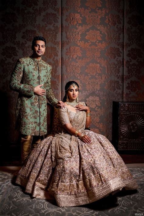 stunning and gorgeous chennai engagement with a bride in custom outfits couple wedding dress