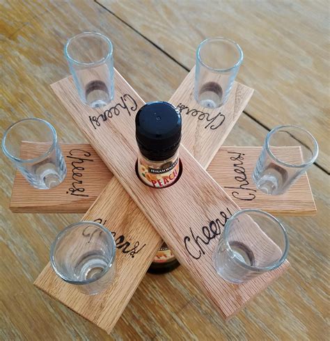 This night owl stays perched beside your bed and keeps your glasses in reach when it's time. Wood Bottle and 6 Shot Glasses Holder - Wood Burned ...