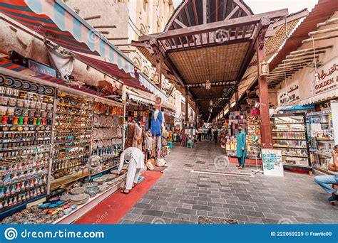 Old Bur Dubai Souk Market In Creek District Sellers And Merchants With Goods Textiles And