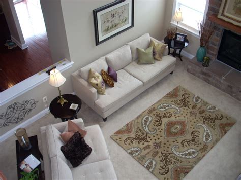 A Rug On Top Of Carpet That Will Give You A Cozy Conversation Zone In