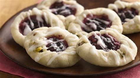 I have been baking these cookies for years recipes you'll love. Lemon Pistachio Blackberry Thumbprints | Recipe | Food recipes, Pillsbury sugar cookies ...