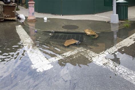 Sewage Drain Clogged Causing Flood On Street Corner Bronx Ny Stock