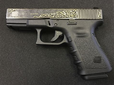 Hand Engraved And Gold Inlaid Factory Glocks The Firearm Blogthe