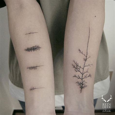 Tree Tattoos On Both Inner Forearms