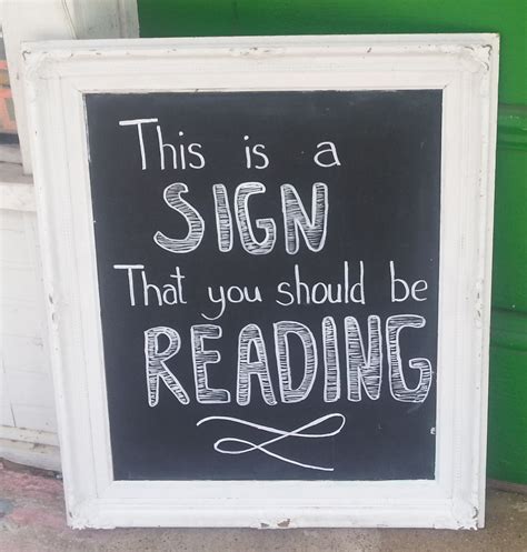 this is a sign that you should be reading the book nook in brenham tx 9 2014 library signs