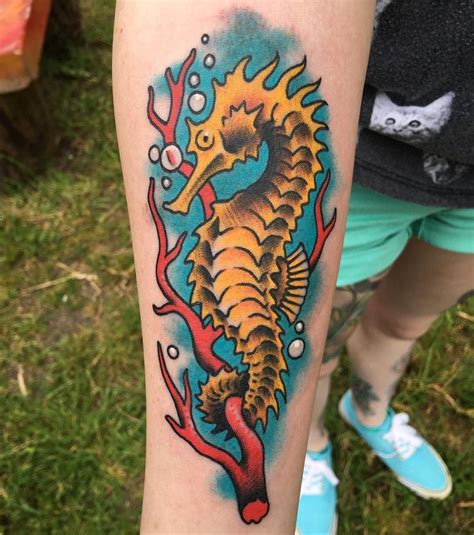 A Colorful Seahorse Tattoo On The Arm