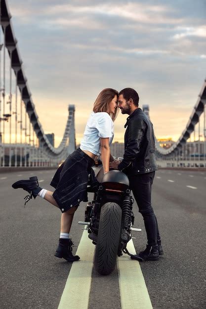 Premium Photo Love And Romantic Concept Beautiful Couple On Motorcycle Stands Opposite Each