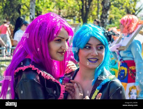 belgrade serbia april 1st 2017 international carnival two girls wearing colorful wigs and