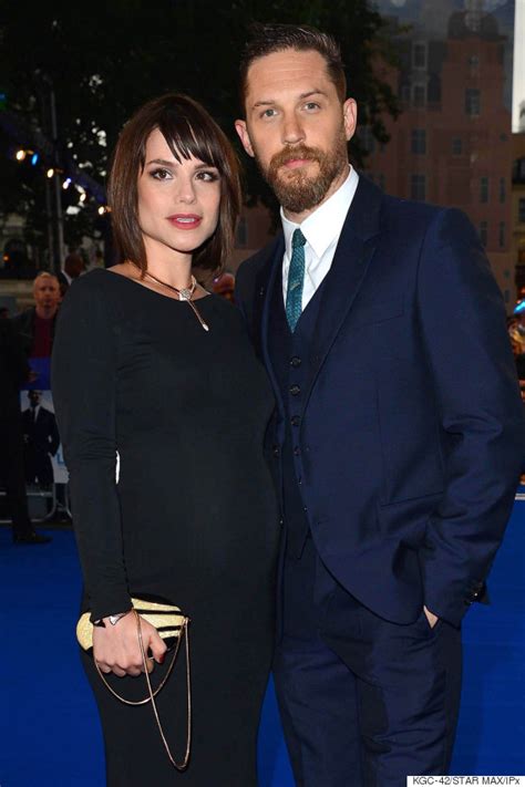 tom hardy s wife charlotte riley reveals pregnancy bump at legend premiere