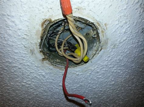 Connect the black wire from the electrical cable with the black wire you just removed from your fixture. Replacing light fixture - box doesn't seem to have a ...