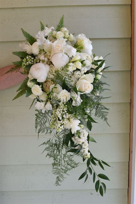 Beautiful Bouquet Cascading In Spring Flowers Including Peony
