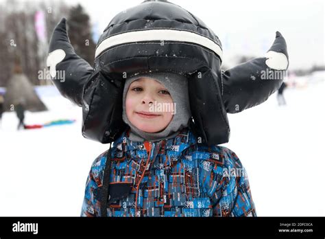 Portrait Of Child In Horned Helmet In Winter Stock Photo Alamy