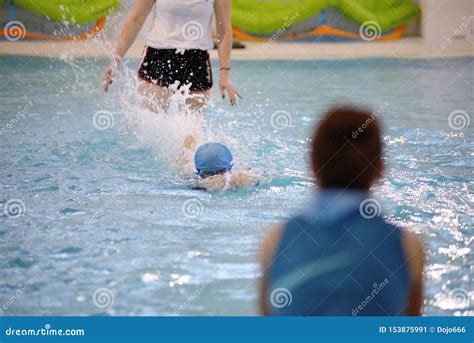 Children Swimming Competition In Pool Relay Race Stock Image Image