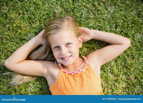 Young Girl Lying On Grass Stock Image Image Of Looking 77902369