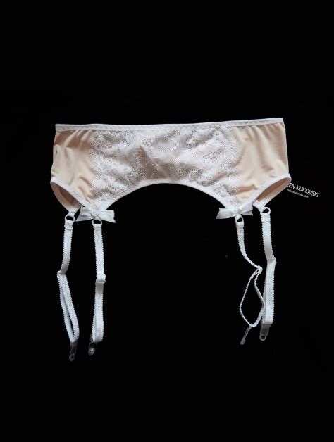 nude and white lace garter belt