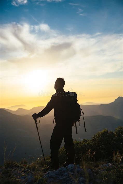 Climber Watching Sunset In Mountains Stock Photo Image Of Vertical