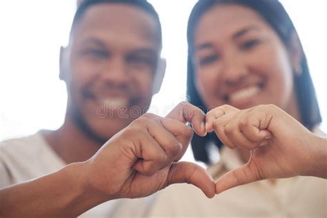 Closeup Of Happy Mixed Race Couple Forming Heart Shape With Hands Two