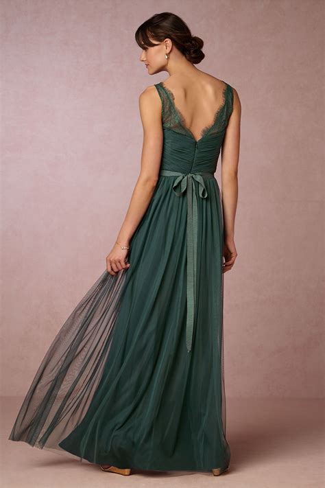 Go ahead and dress up your bridesmaids in dark green this fall season! emerald green bridesmaid dress | Fleur Dress from BHLDN ...