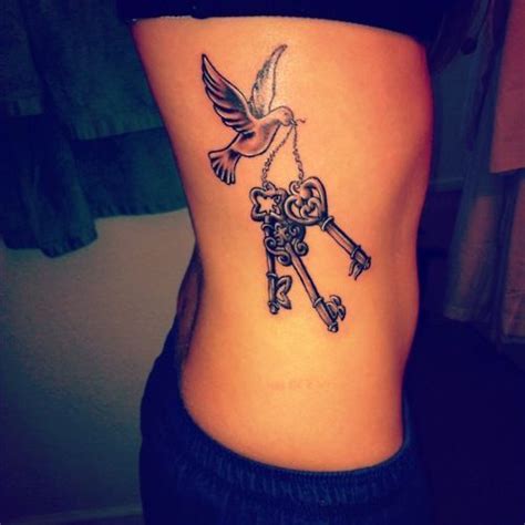 Girls Rib Tattoo With Dove Caring Keys Tattoos Cutetattoos
