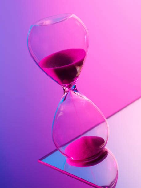 Royalty Free Purple Hourglass Clock Sand Pictures Images And Stock