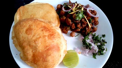 The crispy puffed bhatura makes an excellent combo with hot & spicy chole / chickpeas curry. File:Chole bhature.jpg - Wikimedia Commons