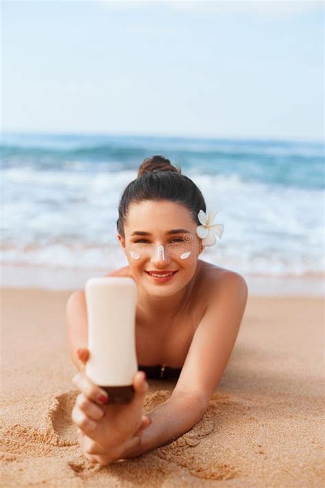 Beauty Woman In Bikini Holding Bottles Of Sunscreen In Her Hands Skincare Stock Photo Image