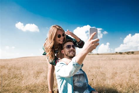 Couple Taking Selfie By Stocksy Contributor Lumina Stocksy