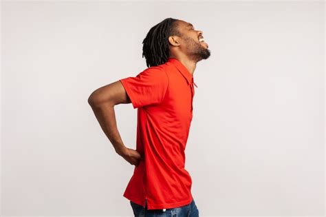 Premium Photo Man Holding His Back Having Sudden Lower Back Pain