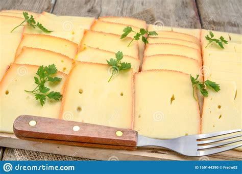 Slices Of Raclette Cheese Stock Photo Image Of Freshness