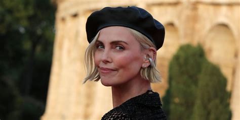 Charlize Theron Wore A Naked Dress In Rome And Her Entire Bod Is Pure Muscle