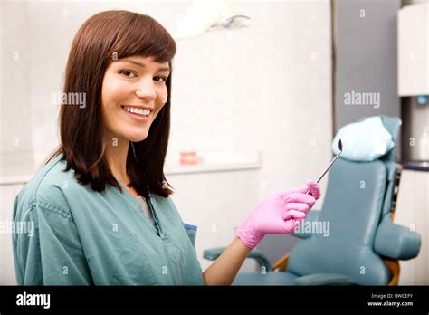 A woman dentist or dental hygienist portrait Stock Photo - Alamy