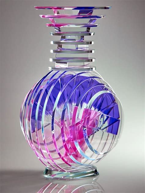 A Colorful Glass Vase Sitting On Top Of A Table